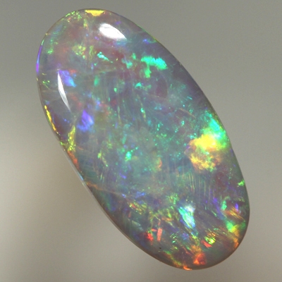 SOLID SEMI BLACK OPAL Bright sparkles, red, orange, green